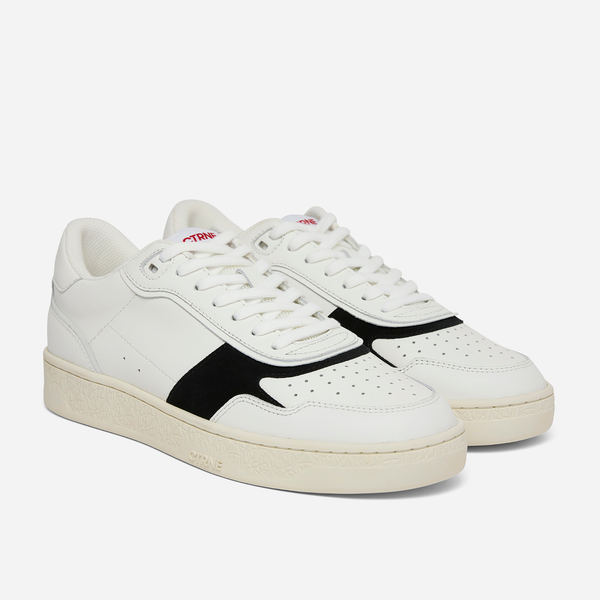Zapatillas Orgonite Manifest en blanco, negro, rojo y cuero