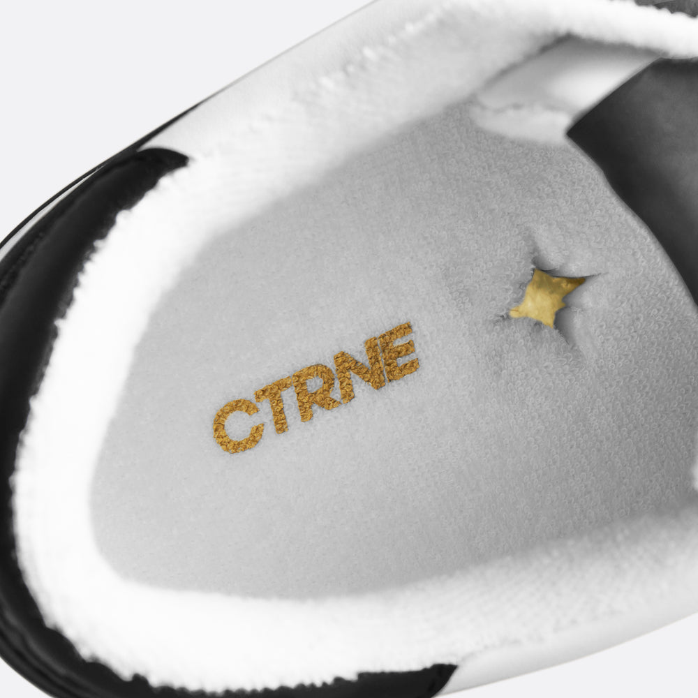 Orgonite Manifest Sneaker in Black/White Leather