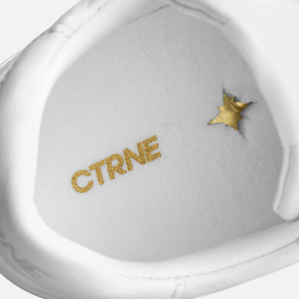 Orgonite Manifest Sneaker in Weiß/Leder