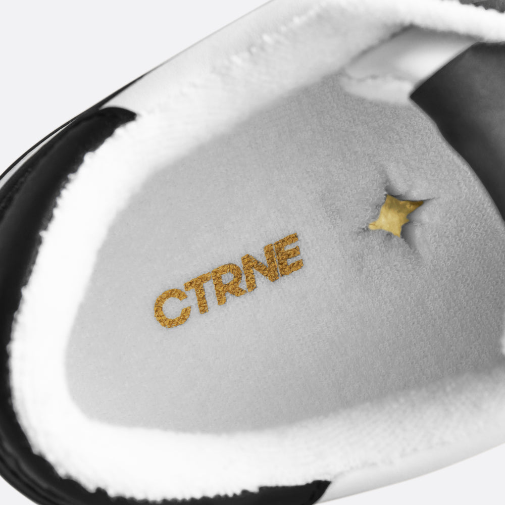 Orgonite Manifest Sneaker in Black/White Leather