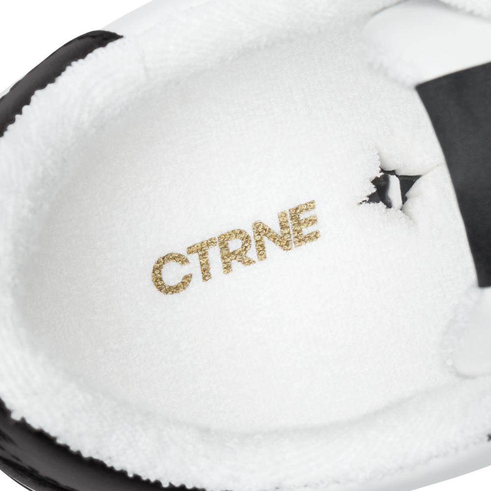 Orgonite Manifest Sneaker in Black/White Leather Ladies