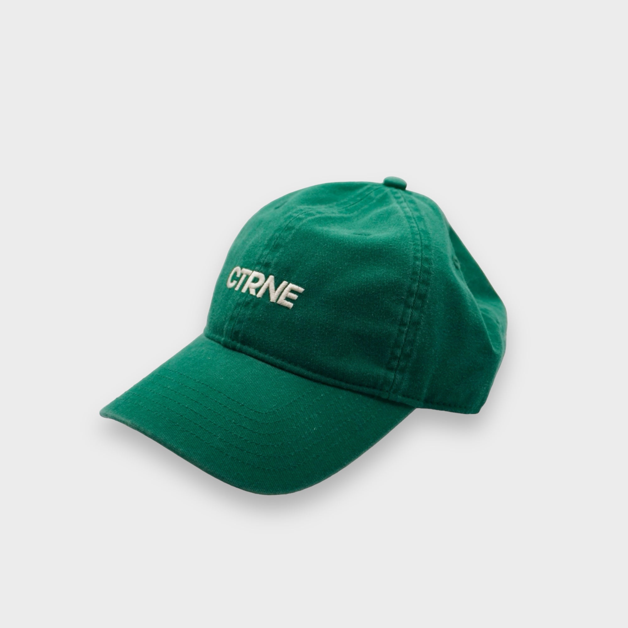 GORRA MANIFIESTA GEODE CON LOGOTIPO VERDE/BLANCO