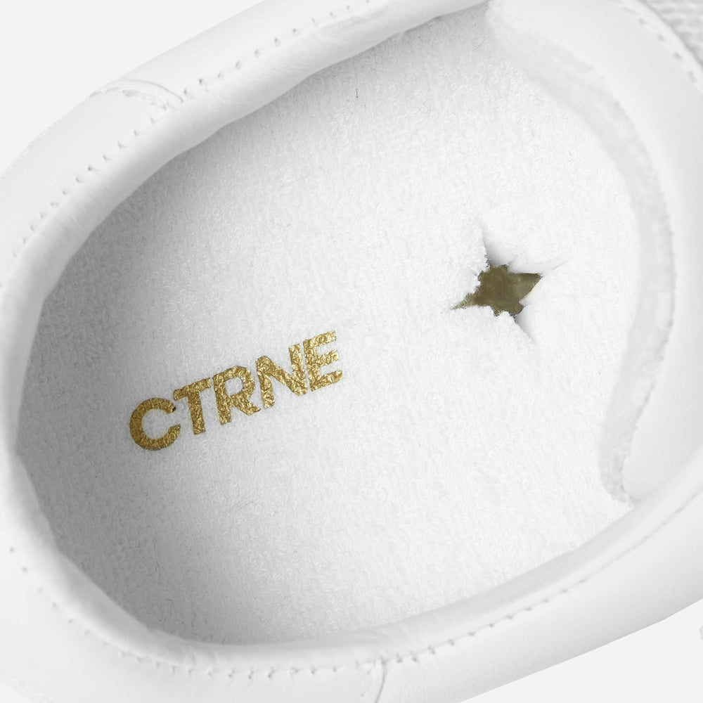 Geode Manifest Sneaker in White/Leather