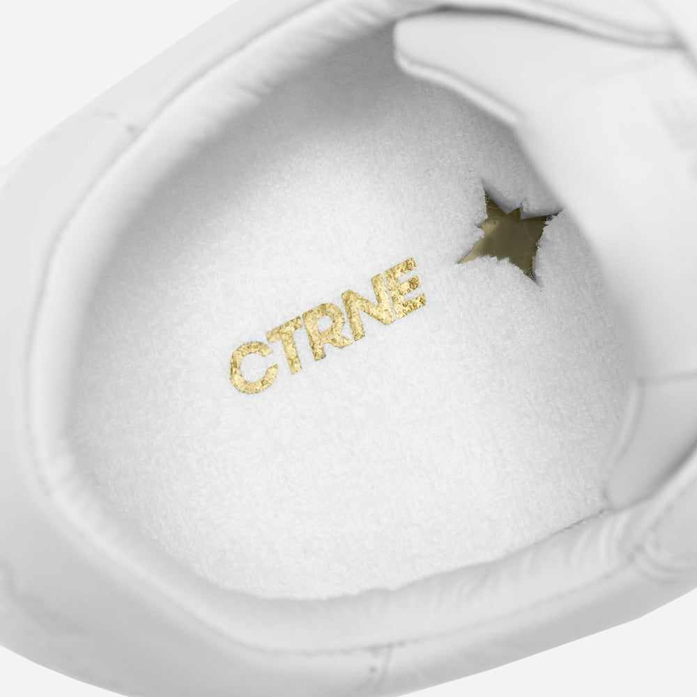 Zapatillas deportivas Orgonite Manifest en color blanco y cuero para mujer